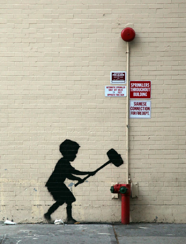 Banksy’s “Hammer Boy”